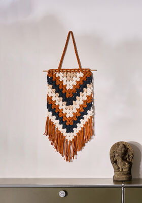 WANDDECORATIE MET STOKJESPATROON The Tube van Lana Grossa